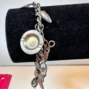 Vintage Coro silver tone charm bracelet with 13 varies charms